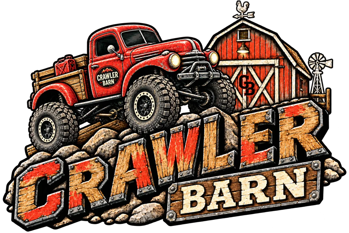 Red Power Wagon crawler beside a rustic barn with Crawler Barn lettering